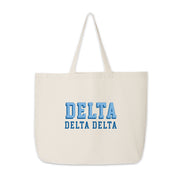 Delta Delta Delta canvas tote showcasing a bold 3D name graphic on a white background.