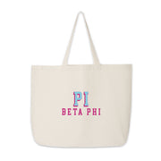 Pi Beta Phi tote bag with raised sorority name print on canvas, shown against white.