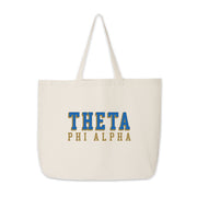 Theta Phi Alpha tote bag with bold 3D printed sorority name, displayed on a white backdrop.