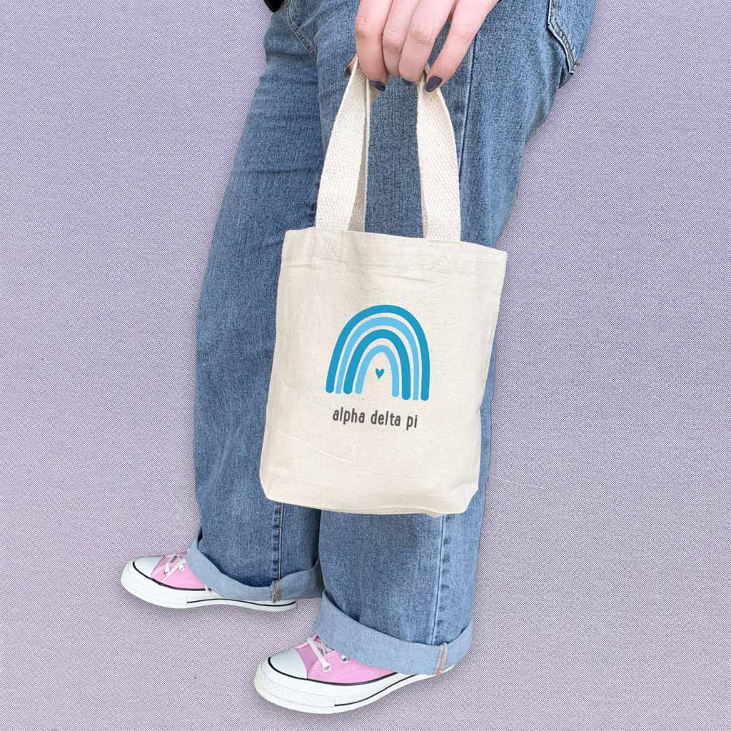 ADP sorority name rainbow design digitally printed on the perfect mini size natural canvas tote bag.