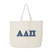 Alpha Delta Pi tote bag with denim-style Greek letters laid flat against a white backdrop.