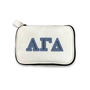 Alpha Gamma Delta cosmetic bag with Alpha Gam denim-style Greek letters, set against a white background.