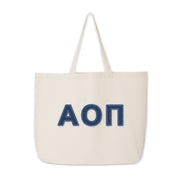 Alpha Omicron Pi tote with denim letters shown upright with handles visible