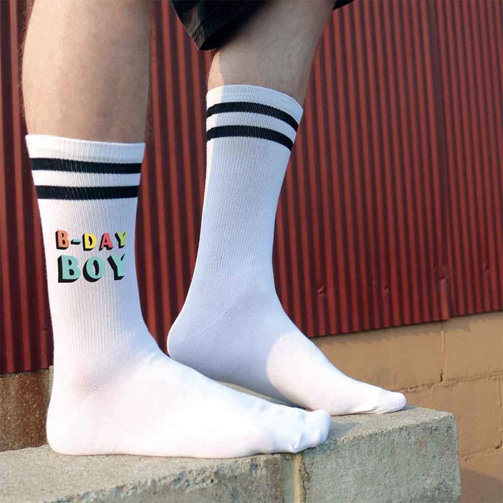 Easy-to-gift birthday socks with “Birthday Boy” printed on black striped socks