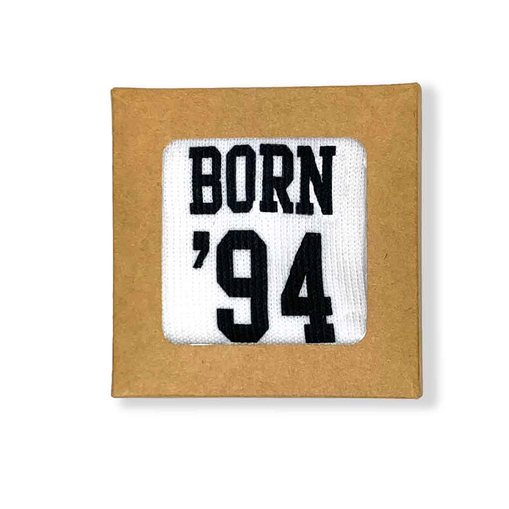 Gift box included with custom socks printed with your birth year and cute design.