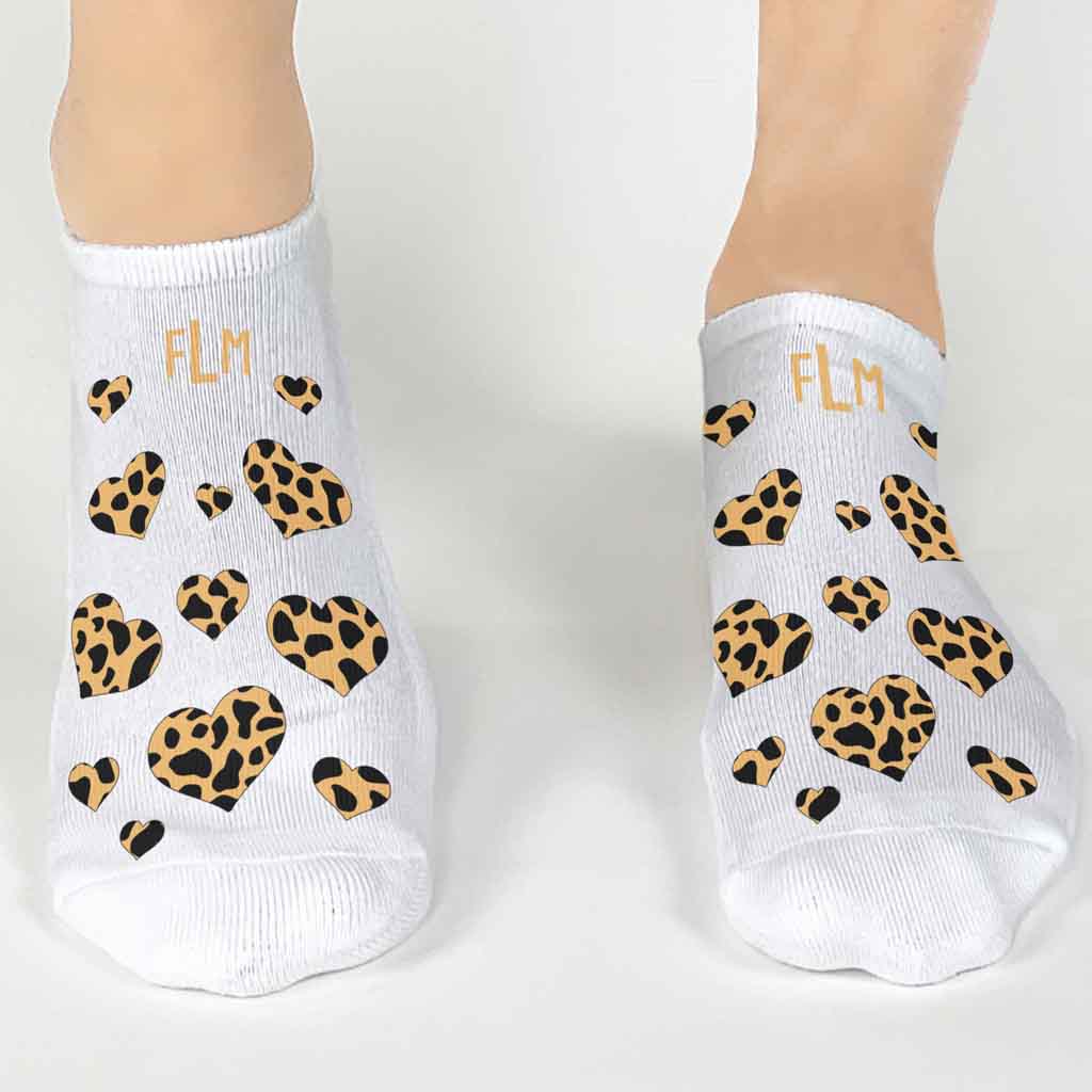 Personalized monogram socks with animal print heart design digitally printed on the top of no show socks in a 3 pair gift box set.