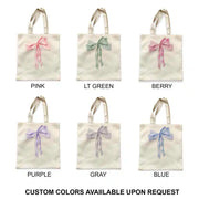 Embrace the coquette trend with a large coquette bow printed on the side, available in 6 chic color options.