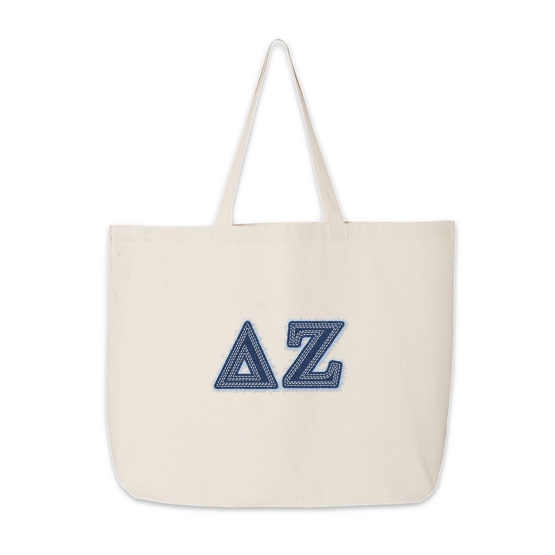 Denim Delta Zeta Greek letter tote shown on a flat surface.