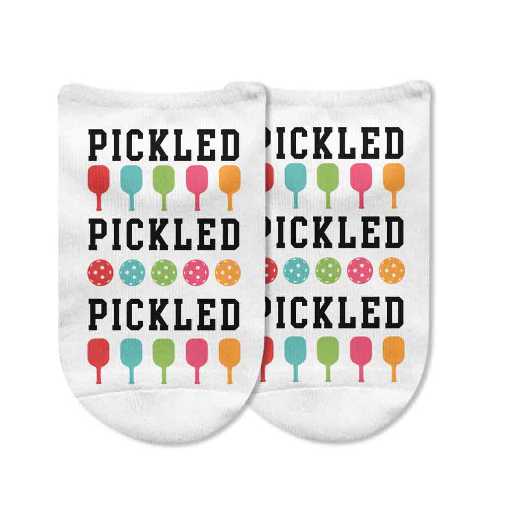 This colorful and cute design is printed on both socks for men and women. A great unisex gift for any pickleball player!