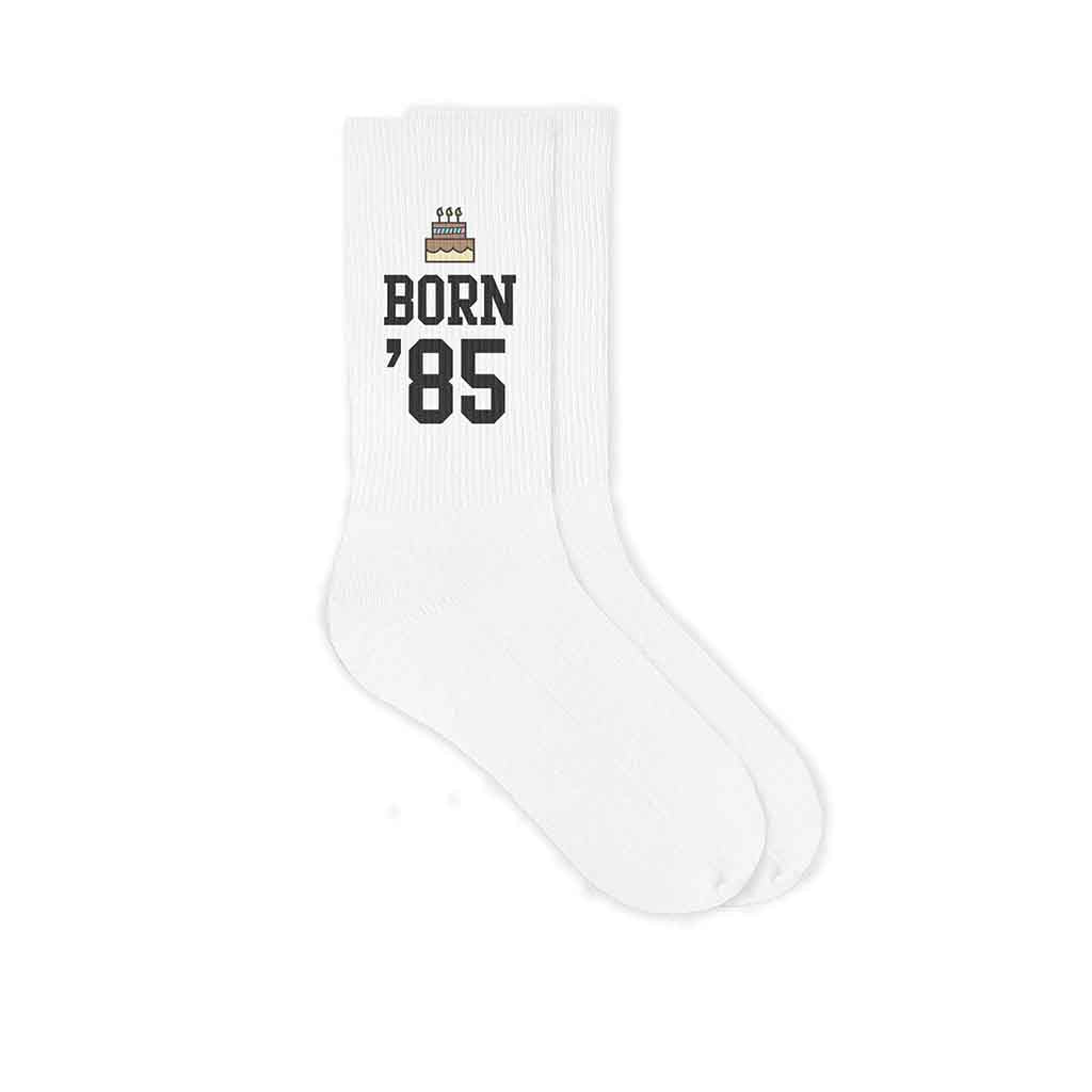 Custom white crew socks printed with your birth year and festive birthday design