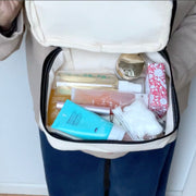 Inside peek of a sorority make up bag to show products fit.