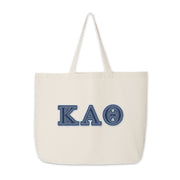 Front-facing image of Kappa Alpha Theta tote with denim Greek letters.