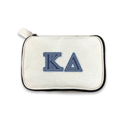 Kappa Delta sorority makeup bag with KD Greek letters printed in a denim-style, shown on white.