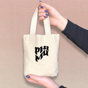 Phi Mu sorority sister with a cute mini tote bag featuring Phi Mu's iconic Greek letters.