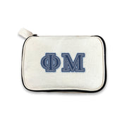 Phi Mu canvas makeup bag with Phi Mu Greek letters in denim-style print, photographed on white.