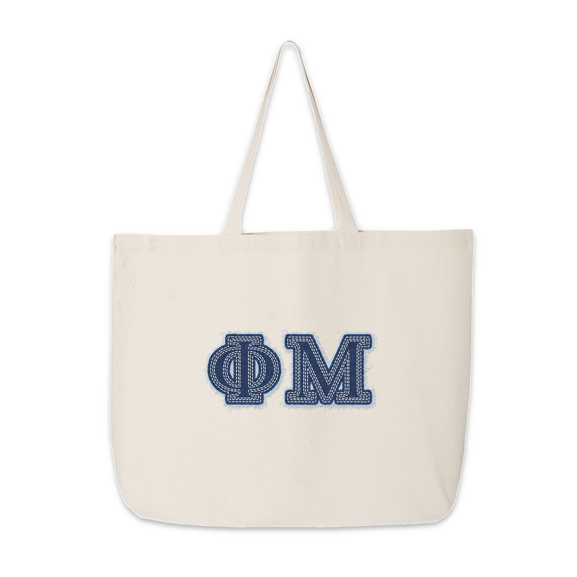Phi Mu canvas tote with denim Greek letters displayed for product view.