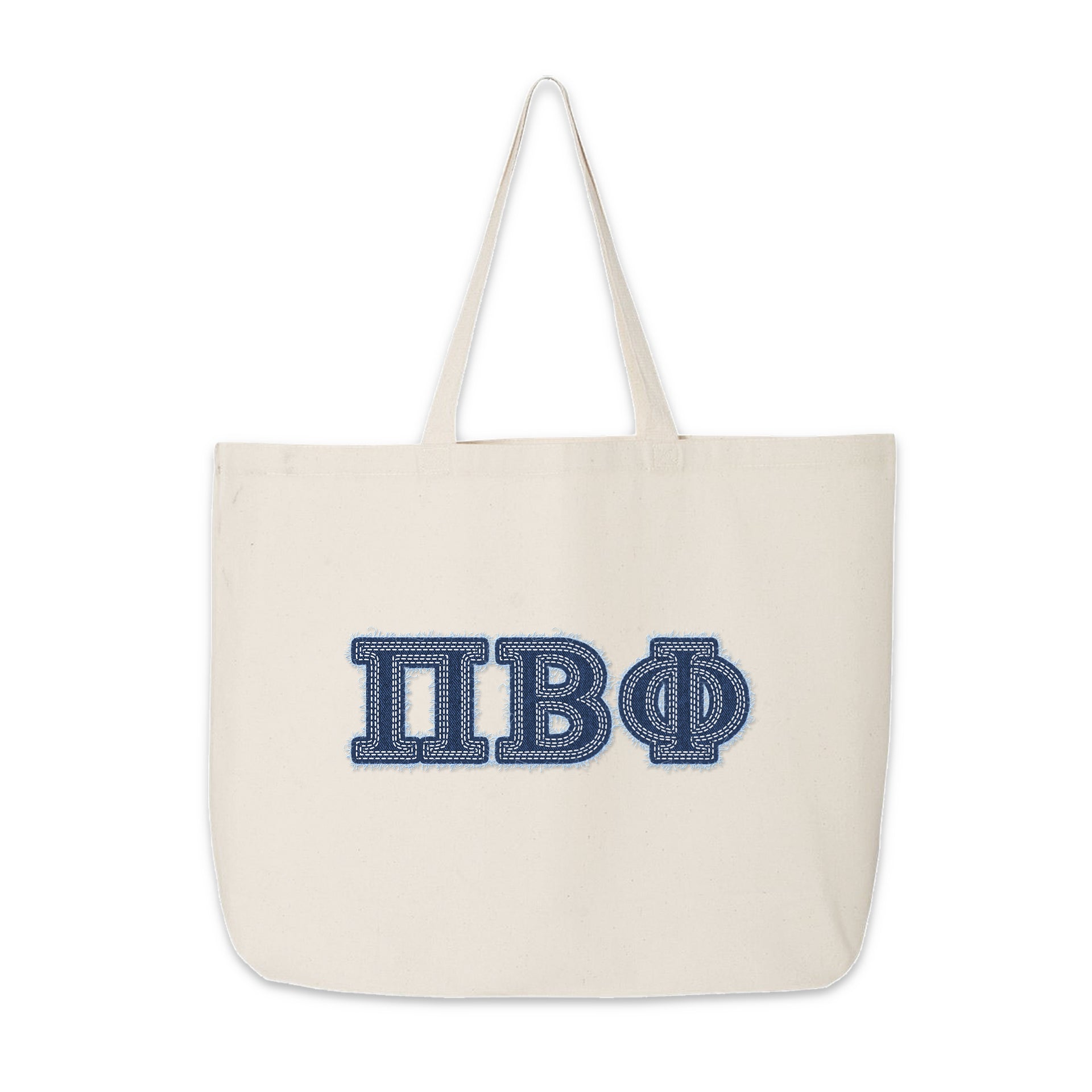 Clean shot of Pi Beta Phi denim letter tote bag standing on a flat surface.
