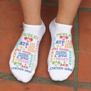 Step onto the court in style with our fun and colorful women's pickleball word design socks.