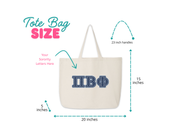 An informational image measuring the sorority tote bag, showcasing its large capacity. The tote is printed with a sorority name and founding date, emphasizing both style and practicality.