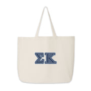 Product photo of the Sigma Kappa tote bag with denim Greek letters.