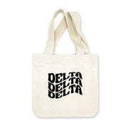 Mini canvas tote bag with a Delta Delta Delta sorority design.
