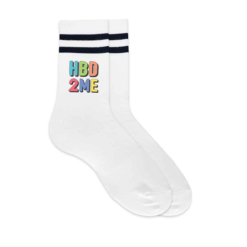 Striped white socks printed with “Happy Birthday to Me” and boxed for gifting