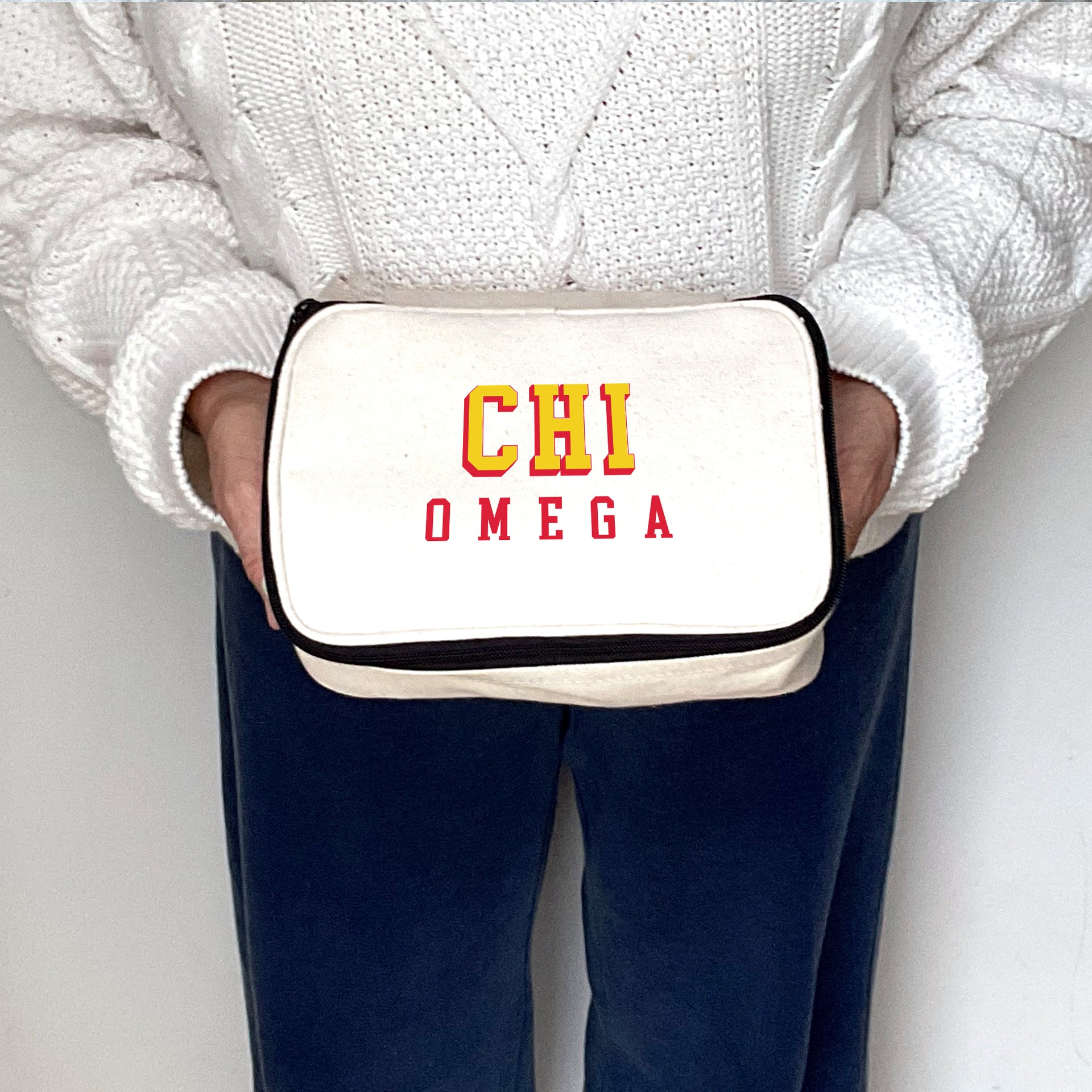 Angled view of Chi Omega 3D Print Sorority Name Cosmetic Make Up Bag showcasing 3D lettering