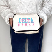 Angled view of Delta Gamma 3D Print Sorority Name Cosmetic Make Up Bag showcasing 3D lettering