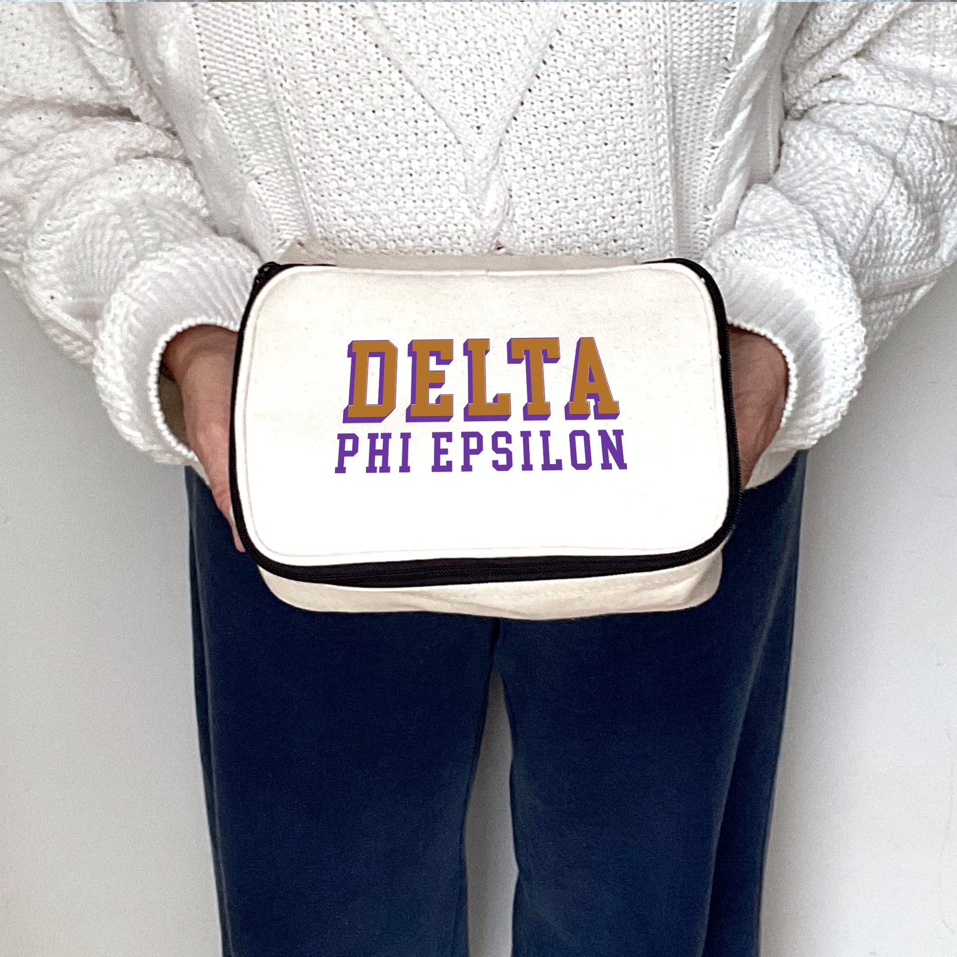 Angled view of Delta Phi Epsilon 3D Print Sorority Name Cosmetic Make Up Bag showcasing 3D lettering