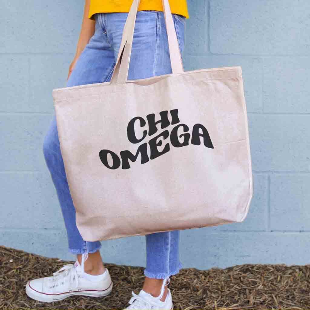 Roomy Chi Omega sorority tote bag with mod design printed on the natural canvas tote bag.