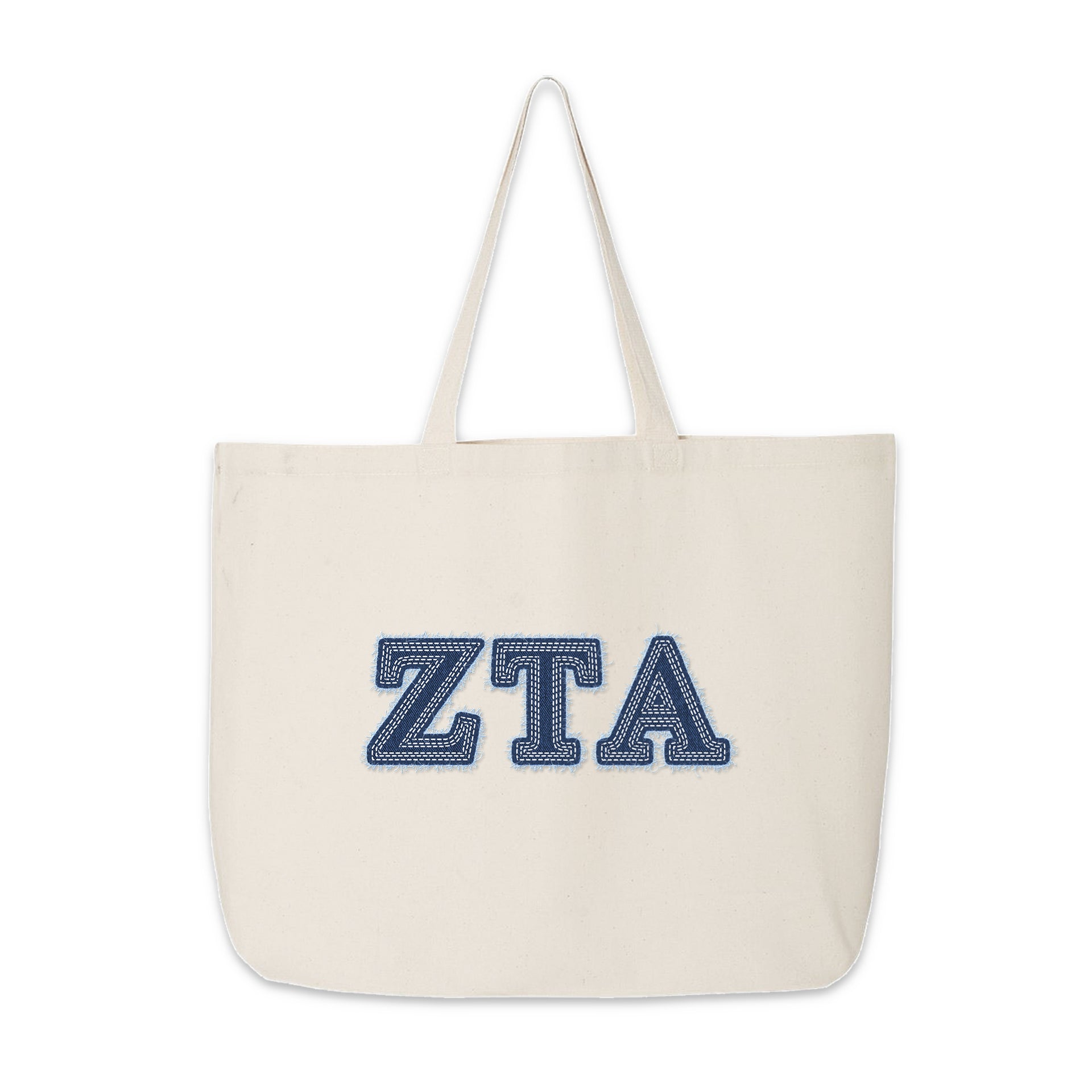 Zeta Tau Alpha tote bag featuring denim-style letters in a clean product shot.