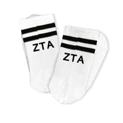 Zeta Tau Alpha striped sorority socks with the text on the back of the leg.