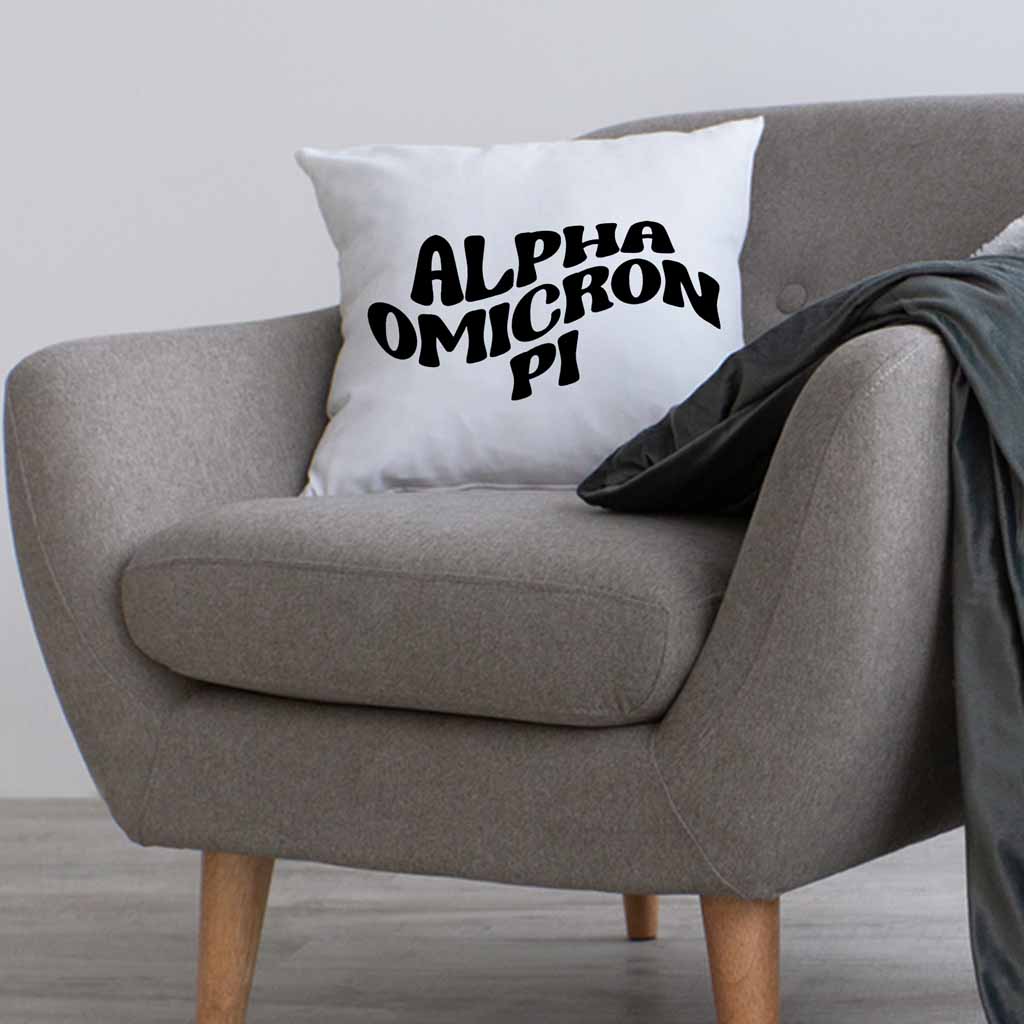 Alpha Omicron Pi sorority name in mod style design digitally printed on throw pillow cover.