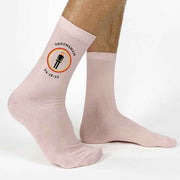 Groom wedding socks personalized with the wedding date and role digitally printed on the sides of the flat knit dress socks, available in nine colors.