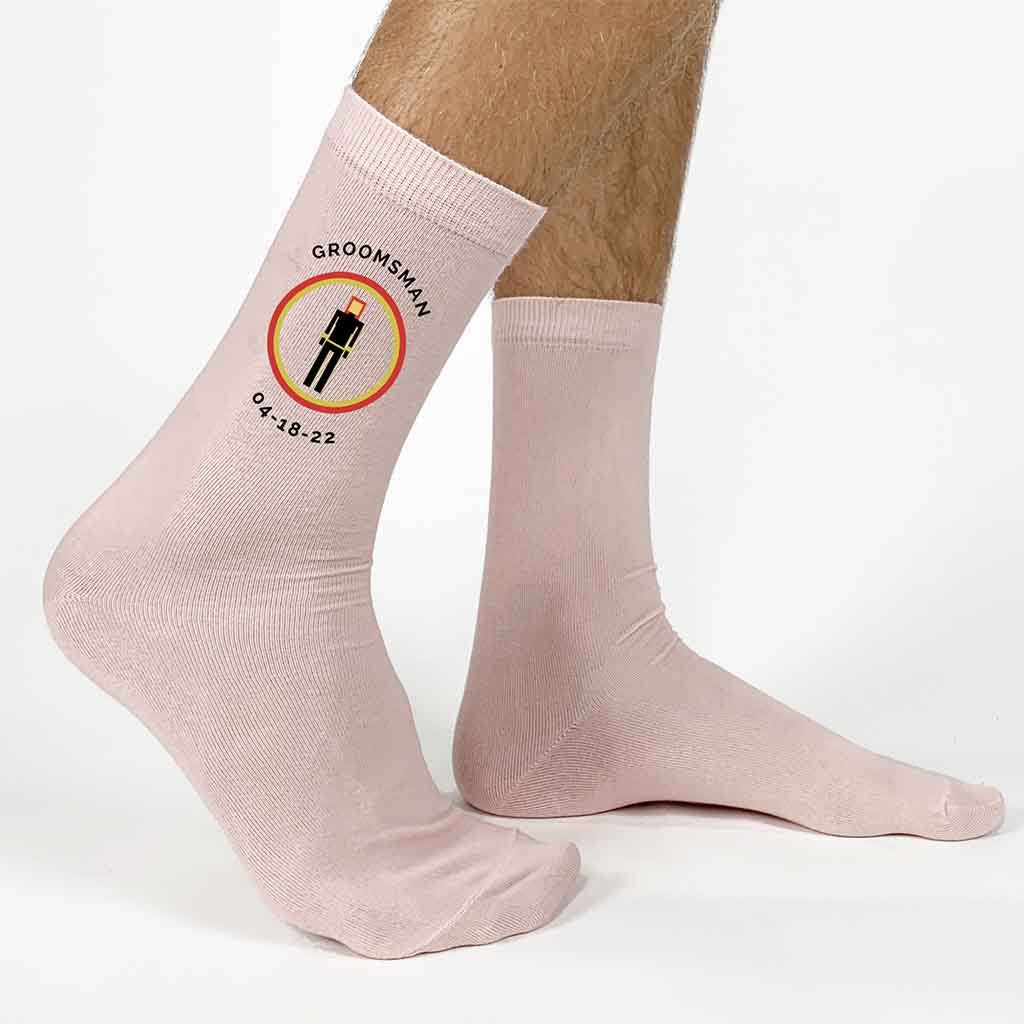 Groom wedding socks personalized with the wedding date and role digitally printed on the sides of the flat knit dress socks, available in nine colors.