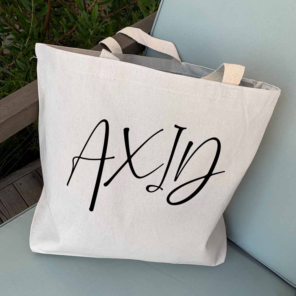 Alpha Xi Delta sorority nickname digitally printed in script writing on canvas tote bag is the perfect accessory for your sorority sister.