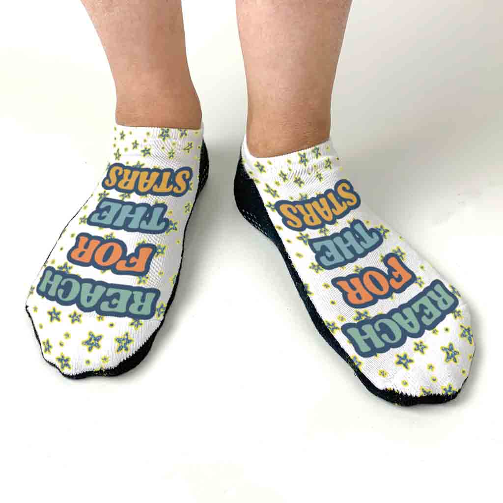 Self motivation socks digitally printed with reach for the stars design.