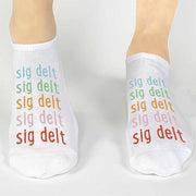 Sigma Delta Tau sorority custom printed repeating rainbow letter design on comfy cotton no show socks