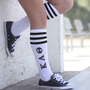 Kappa Alpha Theta sorority letters digitally printed in black ink on black striped knee high socks