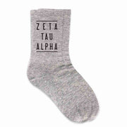 Zeta Tau Alpha sorority name custom printed on heather gray cotton crew socks