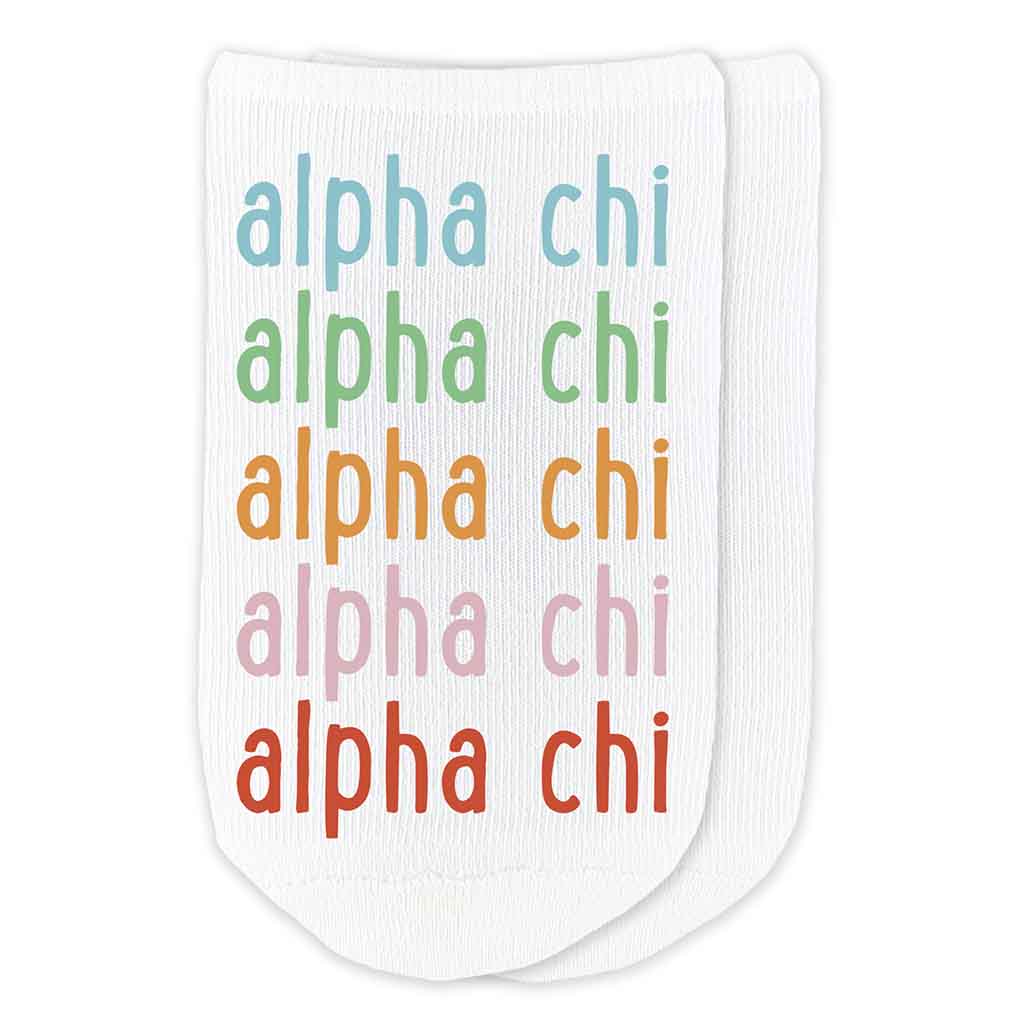 Alpha Chi rainbow repeat design digitally printed on white cotton no show socks.