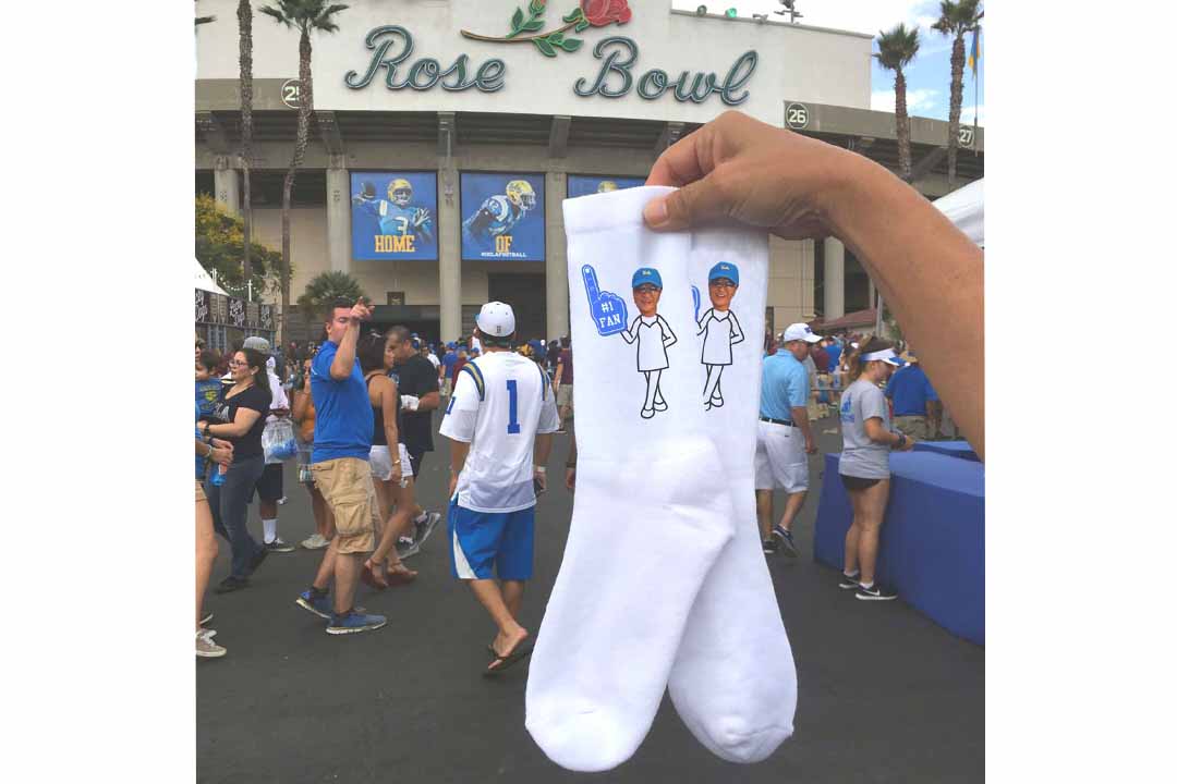ucla fan socks in front of the Rose Bowl