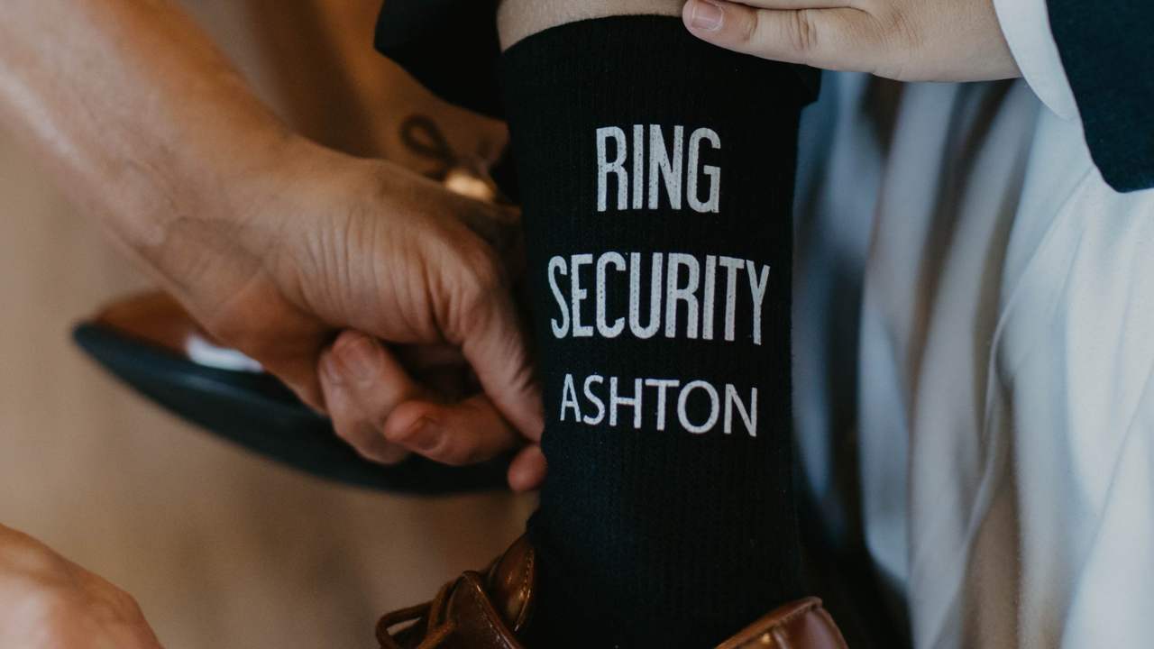 Personalized and custom printed socks for the ring bearer in the wedding party.