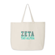 Zeta Tau Alpha cotton tote with dimensional lettering in 3D style, styled on white.