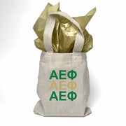 Sorority letters printed in sorority colors on mini natural canvas tote bag makes the perfect gift for your sorority sisters.