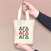 Alpha Gamma Delta sorority letters in sorority colors digitally printed on the perfect mini size natural canvas tote bag.