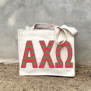 AXO Sorority Stripe In Sorority striped letters on a small canvas tote bag