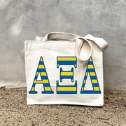 AXiD Sorority Stripe In Sorority striped letters on a small canvas tote bag