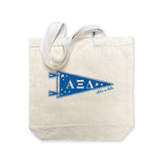 Alpha Xi Delta collegiate pennant medium size canvas tote bag featuring Alpha Xi Delta Greek letters on a white background