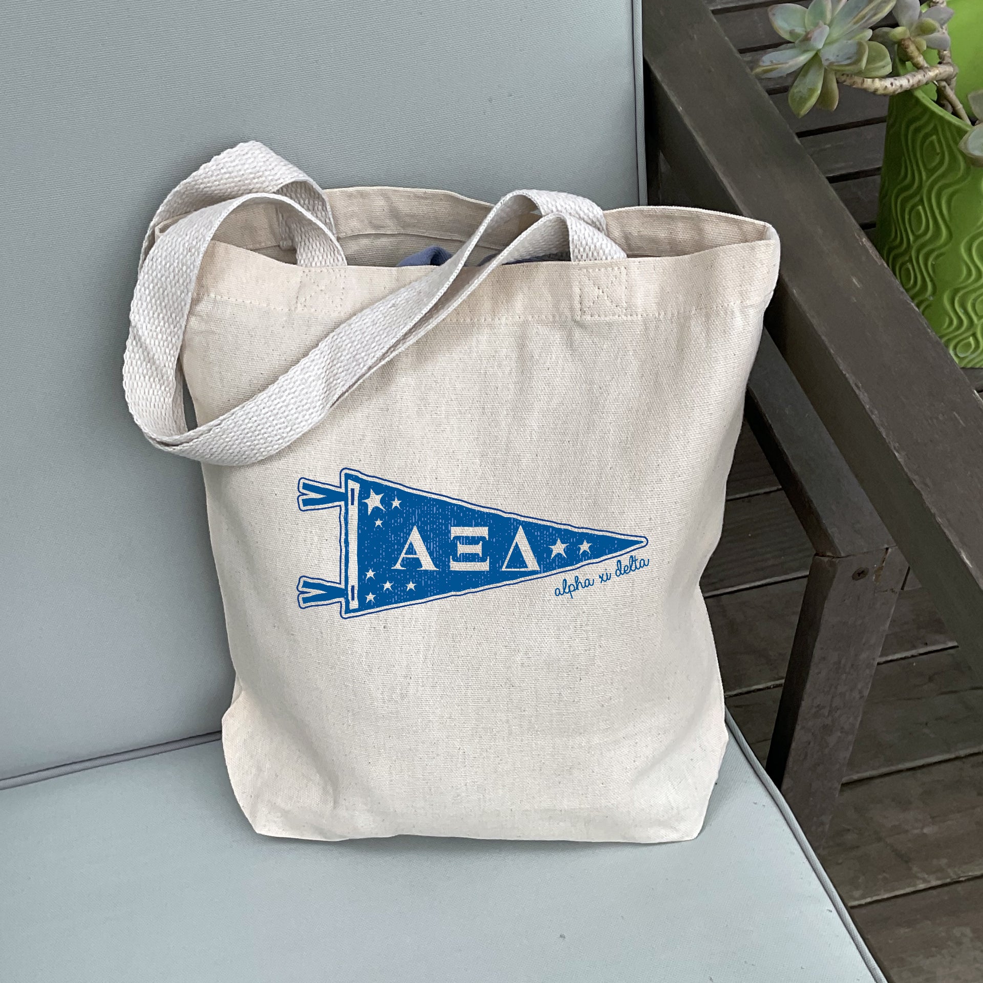 Alpha Xi Delta Collegiate Pennant design on a medium size canvas tote bag